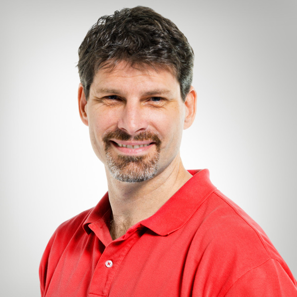 Smiling professional man ready to build what he knows into a business