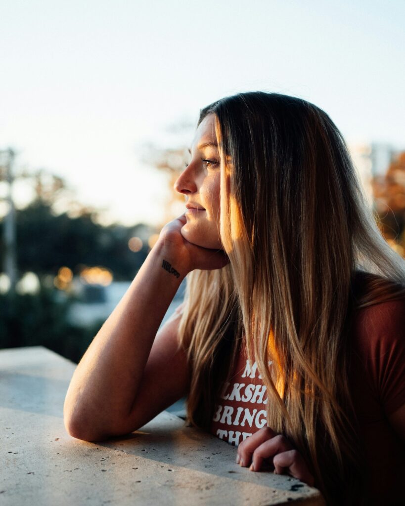Woman reflecting on her purpose and next steps